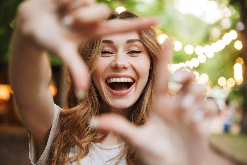 young woman showing off her smile